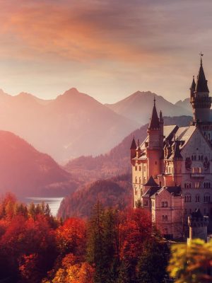 Tipical,Postcard.,Majestic,Neuschwanstein,Castle,During,Sunset,,With,Colorful,Clouds